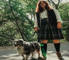 Faith has also adopted a dog and loves to go for a walk with him. She named the dog Pupper.